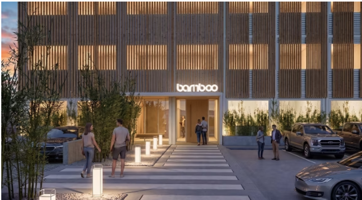 Bamboo hotel entrance at dusk
